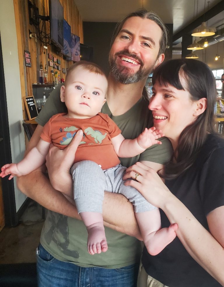 The owners, Tom and Amy, and their little boy.